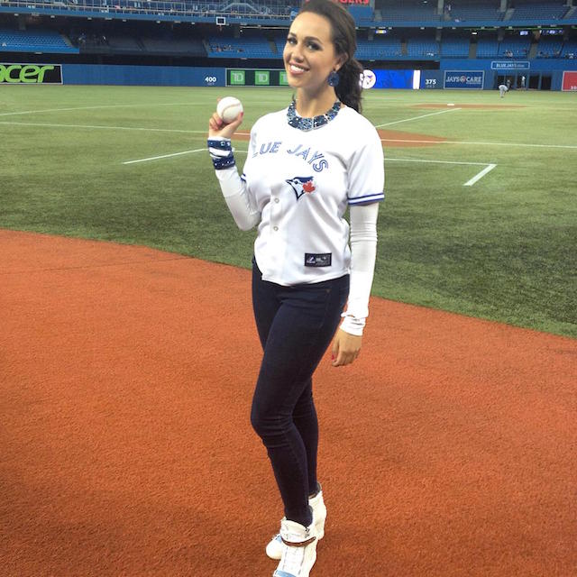 Miss Universe Canada throws out the first pitch at the Blue Jays